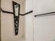 A contemporary shower with a modern design, including a unique shower system and black accents at 5339 S Windermere St, Littleton, CO 80120