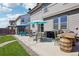 Backyard patio perfect for outdoor gatherings with ample seating, a grill, and easy access to green space at 1846 Osprey Dr, Brighton, CO 80601