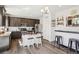 The kitchen features stainless steel appliances, an island with wooden countertop, and a pantry at 1846 Osprey Dr, Brighton, CO 80601