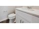Modern bathroom with white vanity and quartz countertop at 1322 Bloom St, Brighton, CO 80601