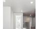 Upper hallway with doors to bedrooms and stairs at 1322 Bloom St, Brighton, CO 80601