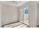 Bright living room featuring a sliding door, providing access to an outdoor patio or balcony area at 18954 E 57Th Pl # D, Denver, CO 80249