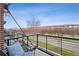 Relaxing balcony features a view of lush greenery and neighboring buildings, perfect for enjoying a serene outdoor experience at 4108 W 118Th Pl, Westminster, CO 80031