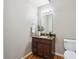 Cozy powder room with modern vanity, granite countertop, and updated fixtures at 4108 W 118Th Pl, Westminster, CO 80031
