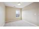A bright, carpeted bedroom with a window offering views of the outside at 4108 W 118Th Pl, Westminster, CO 80031
