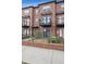 Charming brick townhomes featuring private balconies and well-manicured landscaping, offering a welcoming curb appeal at 4108 W 118Th Pl, Westminster, CO 80031