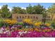 Bradburn neighborhood signage featuring colorful flowers under a clear blue sky at 4108 W 118Th Pl, Westminster, CO 80031