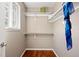 Walk-in closet with a window and built-in shelving at 20293 E Progress Pl, Centennial, CO 80015