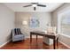 Cozy office space with hardwood floors, neutral walls, and a ceiling fan at 20293 E Progress Pl, Centennial, CO 80015
