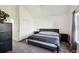 Spacious bedroom with vaulted ceiling, closet, and neutral decor at 5415 S Delaware St, Littleton, CO 80120