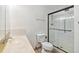 Clean bathroom with a shower and single sink vanity at 655 S Alton Way # 4B, Denver, CO 80247