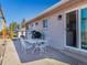 An inviting back patio offers ample space for outdoor seating and dining, with a barbecue area and convenient access to the house at 2619 Mountain View Ave, Franktown, CO 80116