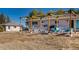 A spacious backyard features a charming pergola, providing a shaded retreat and a picturesque setting for relaxation and entertainment at 2619 Mountain View Ave, Franktown, CO 80116