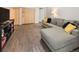 Finished basement with a comfortable sectional sofa and ample storage with closet space at 2619 Mountain View Ave, Franktown, CO 80116