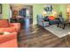 Open concept living and dining areas with stylish decor at 2619 Mountain View Ave, Franktown, CO 80116