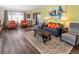 Sun-drenched living room with a stylish sitting arrangement at 2619 Mountain View Ave, Franktown, CO 80116