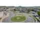 Aerial view of community with clubhouse, pool, and surrounding neighborhood at 479 Black Feather Loop # 311, Castle Rock, CO 80104