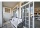Relaxing balcony with comfortable seating and sliding glass doors leading indoors at 479 Black Feather Loop # 311, Castle Rock, CO 80104