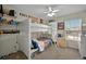 ' bedroom with a bunk bed, ceiling fan, and window at 479 Black Feather Loop # 311, Castle Rock, CO 80104