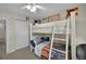 Bedroom featuring a bunk bed, closet, and ceiling fan at 479 Black Feather Loop # 311, Castle Rock, CO 80104
