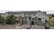 Charming townhouse with stone accents and a well-maintained front exterior in a desirable community at 479 Black Feather Loop # 311, Castle Rock, CO 80104