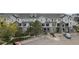 Exterior of townhome featuring a neutral color scheme and well maintained landscape at 479 Black Feather Loop # 311, Castle Rock, CO 80104