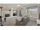 Comfortable living room with a fireplace, large window and a sliding door, offering a relaxing atmosphere at 479 Black Feather Loop # 311, Castle Rock, CO 80104