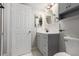 Nicely renovated bathroom with tiled backsplash and modern fixtures at 2575 S Syracuse Way # B101, Denver, CO 80231