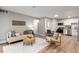 Open-concept living and dining area, complemented by an adjacent, fully equipped kitchen at 2575 S Syracuse Way # B101, Denver, CO 80231
