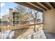 Balcony view of nearby trees and surrounding buildings at 4896 S Dudley St # 6-5, Littleton, CO 80123
