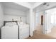 Convenient laundry area equipped with a washer and dryer, offering ease and functionality at 4896 S Dudley St # 6-5, Littleton, CO 80123