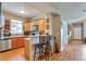 Eat-in kitchen with modern cabinets, granite counters, and stainless steel appliances at 6406 Silver Mesa Dr # F, Highlands Ranch, CO 80130