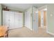 Bedroom with white cabinets and ample storage space at 930 Reed Ct, Lakewood, CO 80214