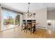 The dining area offers outdoor views and access to the patio at 930 Reed Ct, Lakewood, CO 80214