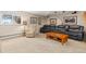 Comfortable living room with a plush leather sofa, recliner, and natural light at 930 Reed Ct, Lakewood, CO 80214