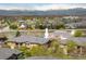 Scenic aerial view of townhomes nestled in a vibrant community with mountain views at 1122 Olympia Ave # 12H, Longmont, CO 80504