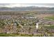 An aerial view of a neighborhood community with a mountain backdrop at 1122 Olympia Ave # 12H, Longmont, CO 80504