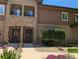 Attractive townhouse featuring stone accents, private balconies, and well-maintained landscaping at 1122 Olympia Ave # 12H, Longmont, CO 80504