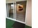 View of balcony and sliding door to kitchen and living room at 750 S Alton Way # 8C, Denver, CO 80247