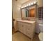 Bathroom features a combination tub/shower and updated vanity at 750 S Alton Way # 8C, Denver, CO 80247