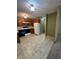 Kitchen features classic wood cabinets, black appliances, and plenty of space at 750 S Alton Way # 8C, Denver, CO 80247