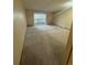 This spacious living room offers a blank canvas and sliding door to patio at 750 S Alton Way # 8C, Denver, CO 80247