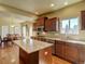 Spacious kitchen featuring granite countertops and modern appliances at 1235 Woodmoor Acres Dr, Monument, CO 80132