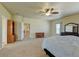 Bright main bedroom featuring neutral walls, carpet, and ample space for furniture at 1235 Woodmoor Acres Dr, Monument, CO 80132