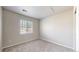 This room has plush carpeting and a window for natural light at 17926 E 104Th Way # C, Commerce City, CO 80022