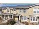 Charming exterior with neutral siding, large windows, and a well-manicured front yard, perfect for curb appeal at 17926 E 104Th Way # C, Commerce City, CO 80022