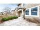 Charming front entrance featuring stone pillars and a well-manicured yard at 17926 E 104Th Way # C, Commerce City, CO 80022