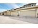 Row of attached garages, providing convenient and secure parking for residents at 17926 E 104Th Way # C, Commerce City, CO 80022