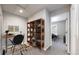 The office space features a desk, chair, and unique shelving unit for storage and decor at 17926 E 104Th Way # C, Commerce City, CO 80022