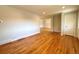 Spacious living room with hardwood floors, neutral walls, and great natural light at 8239 Nola Dr, Denver, CO 80221